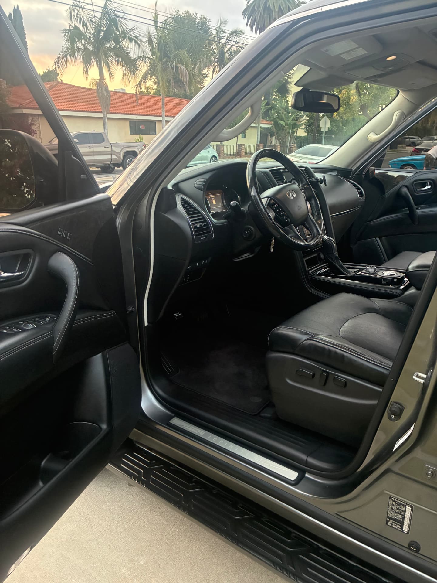 Freshly detailed black leather front seats, dashboard and door panel